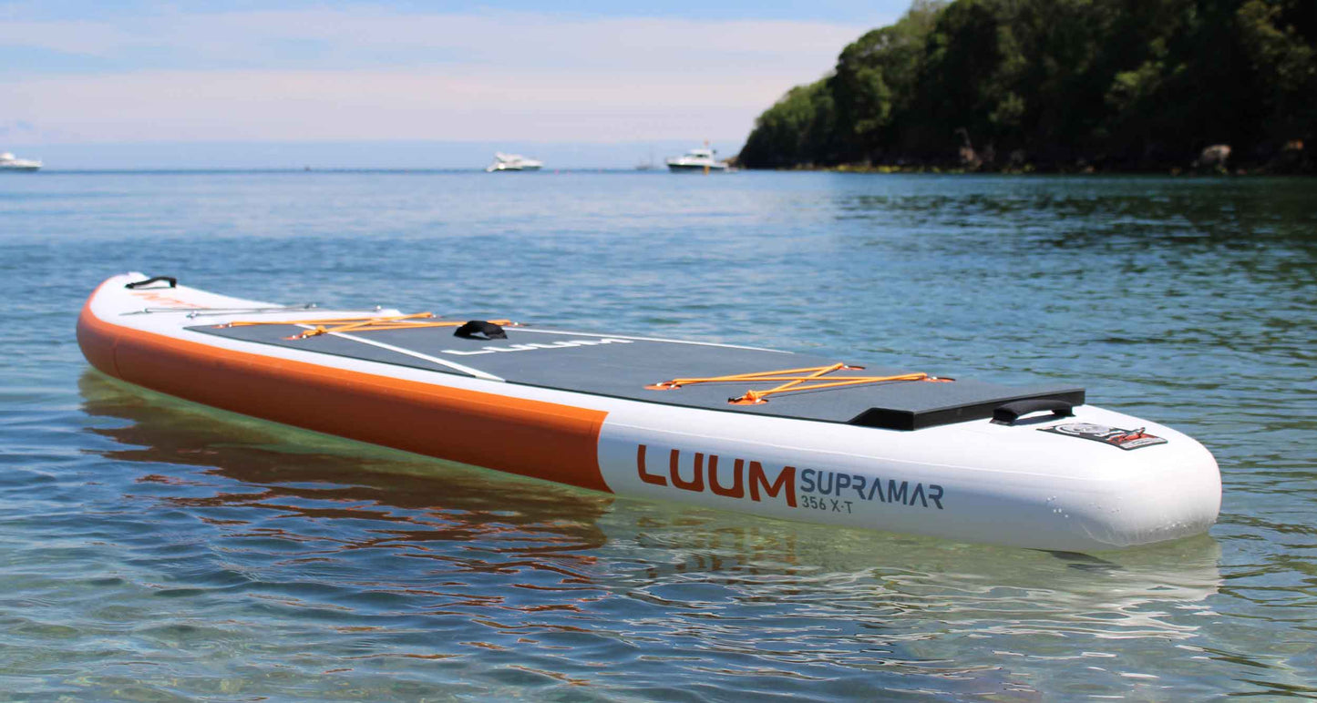 inflatable touring paddleboard on sea